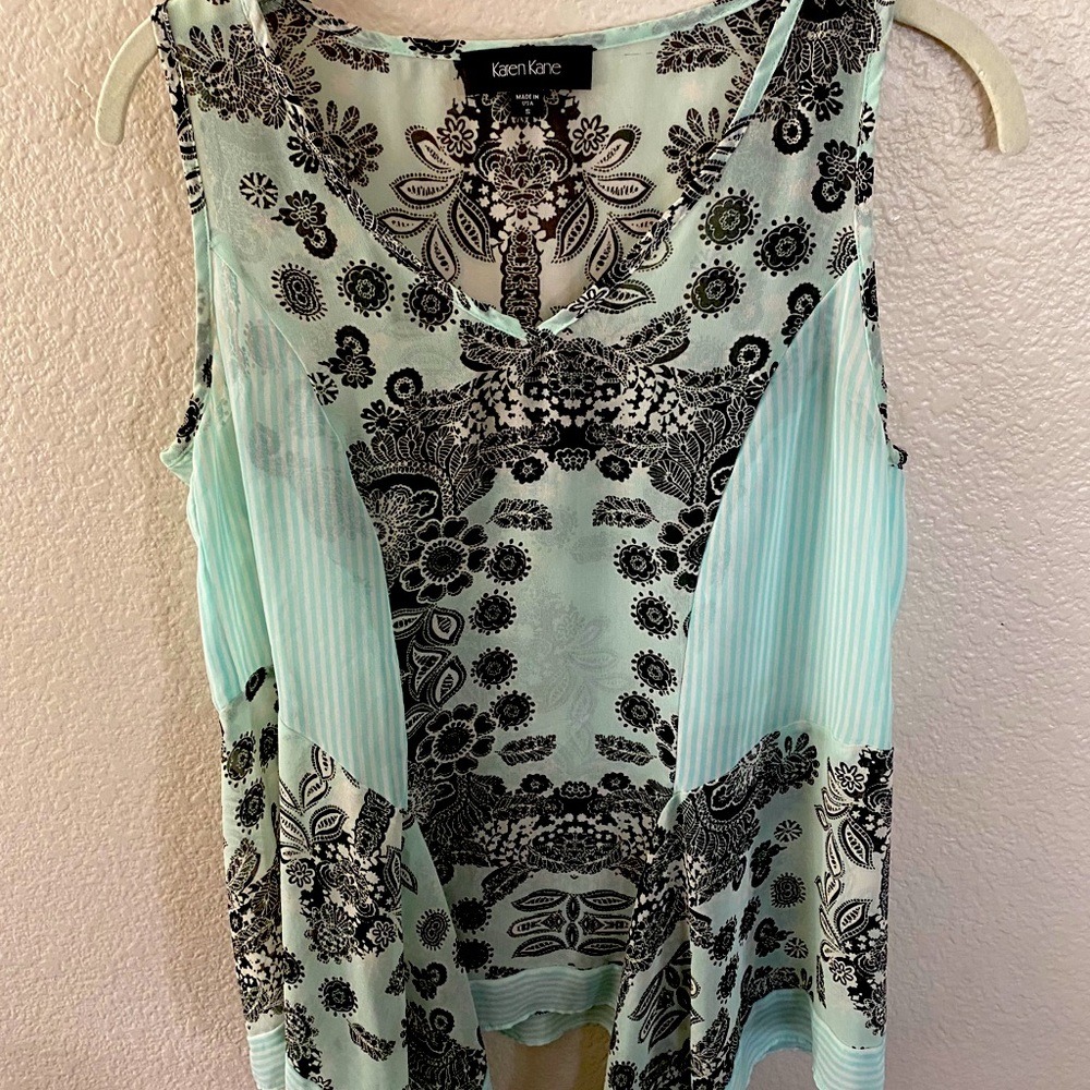 Teal and black top